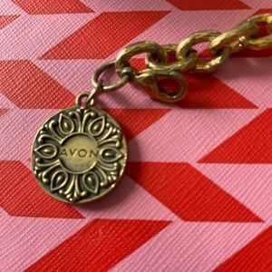 Vintage Avon President's Club Charm Bracelet. Please view all pics.